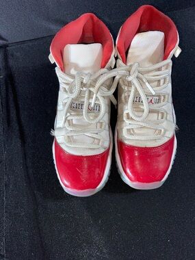 Nike Air Jordan 11 Retro Red and White Glossy Toe Sneakers